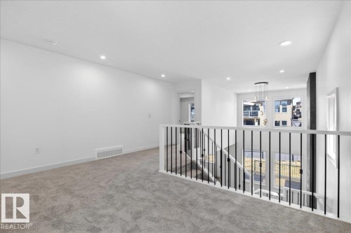 1150 Gyrfalcon Crescent, Edmonton, AB - Indoor Photo Showing Other Room