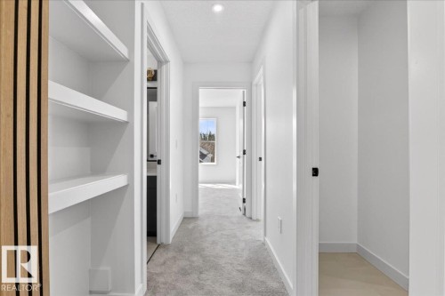 1150 Gyrfalcon Crescent, Edmonton, AB - Indoor Photo Showing Other Room