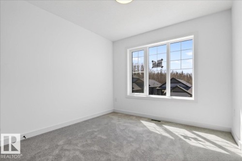 1150 Gyrfalcon Crescent, Edmonton, AB - Indoor Photo Showing Other Room