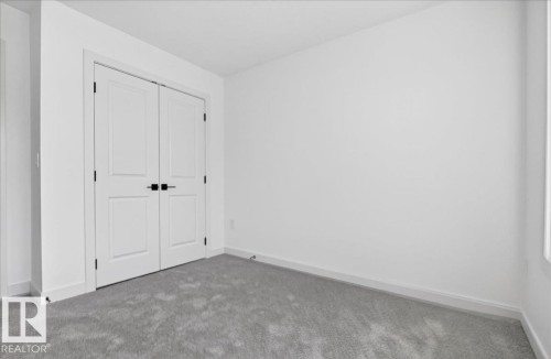 1150 Gyrfalcon Crescent, Edmonton, AB - Indoor Photo Showing Other Room