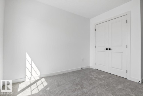 1150 Gyrfalcon Crescent, Edmonton, AB - Indoor Photo Showing Other Room