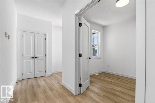 1150 Gyrfalcon Crescent, Edmonton, AB - Indoor Photo Showing Other Room
