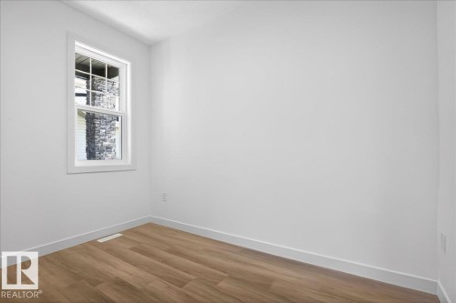 1150 Gyrfalcon Crescent, Edmonton, AB - Indoor Photo Showing Other Room