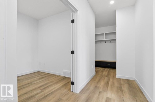 1150 Gyrfalcon Crescent, Edmonton, AB - Indoor Photo Showing Other Room