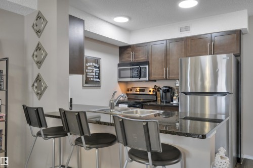 208 11820 22 Avenue, Edmonton, AB - Indoor Photo Showing Kitchen With Stainless Steel Kitchen With Double Sink