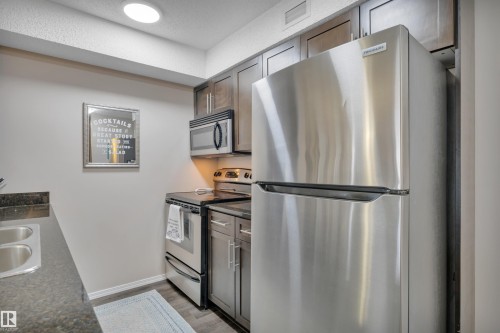 208 11820 22 Avenue, Edmonton, AB - Indoor Photo Showing Kitchen With Stainless Steel Kitchen With Double Sink
