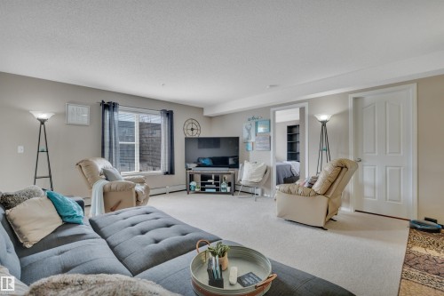 208 11820 22 Avenue, Edmonton, AB - Indoor Photo Showing Living Room