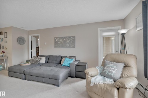 208 11820 22 Avenue, Edmonton, AB - Indoor Photo Showing Living Room
