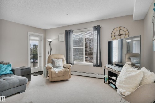 208 11820 22 Avenue, Edmonton, AB - Indoor Photo Showing Living Room