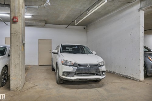 Oversized Parking Stall - 208 11820 22 Avenue, Edmonton, AB - Indoor Photo Showing Garage