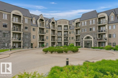 256 6079 Maynard Way, Edmonton, AB - Outdoor With Balcony With Facade