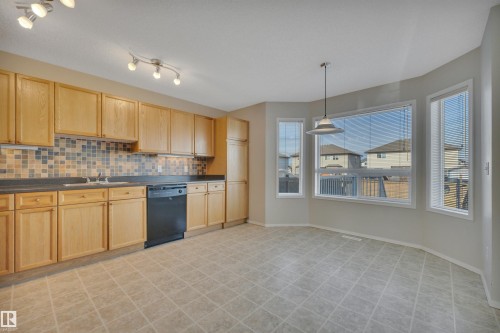 15 Southwick Point, Leduc, AB - Indoor Photo Showing Kitchen With Double Sink