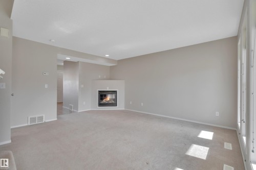 15 Southwick Point, Leduc, AB - Indoor With Fireplace