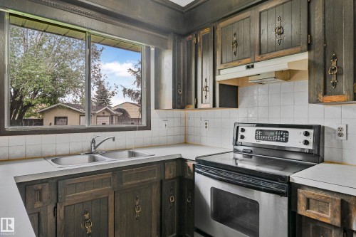 12254 143 Avenue, Edmonton, AB - Indoor Photo Showing Kitchen With Double Sink
