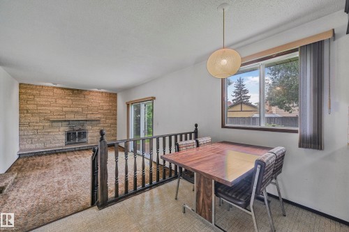 12254 143 Avenue, Edmonton, AB - Indoor Photo Showing Dining Room With Fireplace
