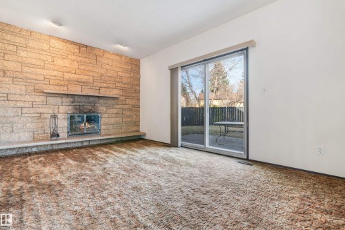 12254 143 Avenue, Edmonton, AB - Indoor Photo Showing Other Room With Fireplace