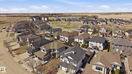 Residential neighborhood featuring a mix of single-family homes and multi-unit dwellings - 3105 65 Street, Beaumont, AB - Outdoor With View