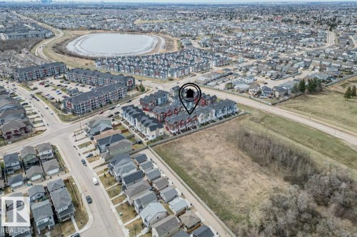 Aerial perspective showcasing a residential area with varied housing styles - 21 979 Crystallina Nera Way, Edmonton, AB - 