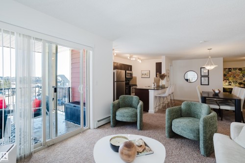 319 5804 Mullen Place, Edmonton, AB - Indoor Photo Showing Living Room