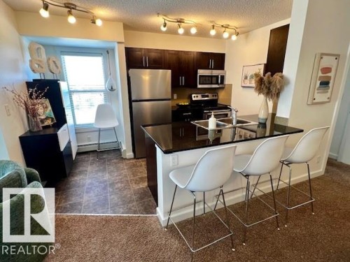319 5804 Mullen Place, Edmonton, AB - Indoor Photo Showing Kitchen
