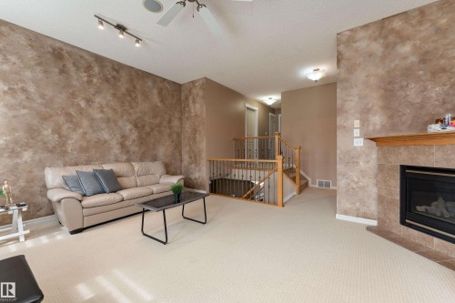 8706 175 Avenue, Edmonton, AB - Indoor Photo Showing Living Room With Fireplace