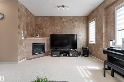 8706 175 Avenue, Edmonton, AB - Indoor Photo Showing Living Room With Fireplace