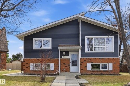 Split-level residence featuring a brick and horizontal siding exterior - 1729 65 Street, Edmonton, AB - Outdoor