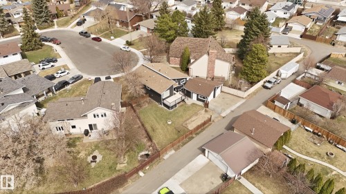 Residential neighborhood featuring a cul-de-sac, paved streets, and a mix of single-family homes - 1729 65 Street, Edmonton, AB - Outdoor With View