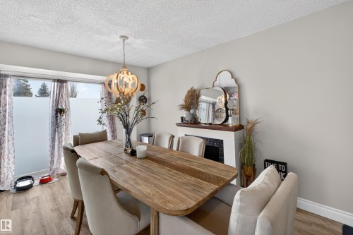 18939 78 Avenue, Edmonton, AB - Indoor Photo Showing Dining Room With Fireplace