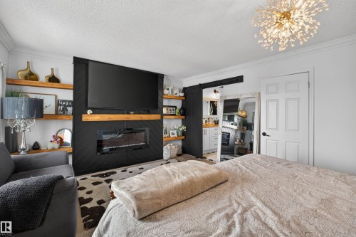 18939 78 Avenue, Edmonton, AB - Indoor Photo Showing Bedroom With Fireplace