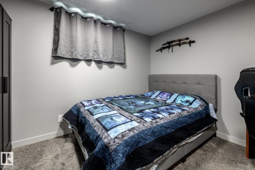 Compact room featuring neutral gray walls and gray carpeting - 7 Doolan Place, St. Albert, AB - Indoor Photo Showing Bedroom