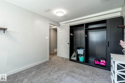 Room featuring neutral-toned carpet flooring and light gray painted walls - 7 Doolan Place, St. Albert, AB - Indoor