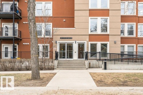 Multi-story residential building featuring a prominent main entrance - 204 10126 144 Street, Edmonton, AB - Outdoor With Balcony With Facade