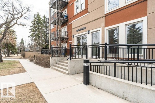 Building exterior, multiple windows, and ramp for handicapped access - 204 10126 144 Street, Edmonton, AB - Outdoor