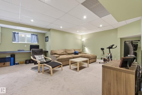 Carpeted interior space featuring recessed lighting and a drop ceiling - 17 171 Brintnell Boulevard, Edmonton, AB - Indoor Photo Showing Other Room