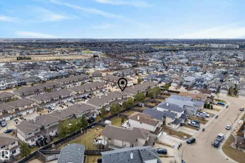 Expansive aerial view of a residential neighborhood featuring rows of detached and attached homes - 17 171 Brintnell Boulevard, Edmonton, AB - Outdoor With View