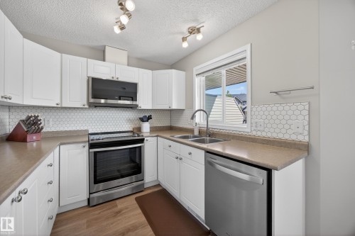 26 4731 Terwillegar Common, Edmonton, AB - Indoor Photo Showing Kitchen With Double Sink