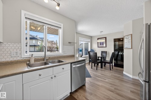26 4731 Terwillegar Common, Edmonton, AB - Indoor Photo Showing Kitchen With Double Sink