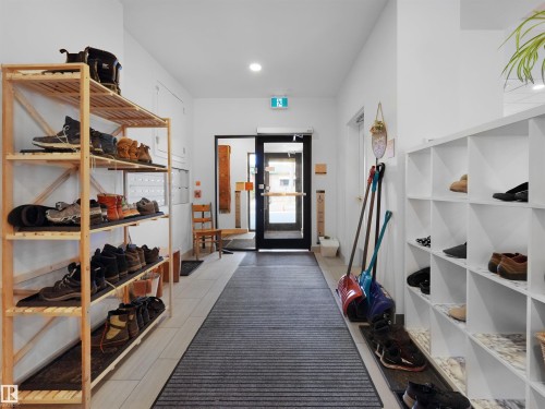 Entryway featuring light wood-finish flooring, white walls, and recessed lighting - 403 10115 88 Avenue, Edmonton, AB - Indoor Photo Showing Other Room