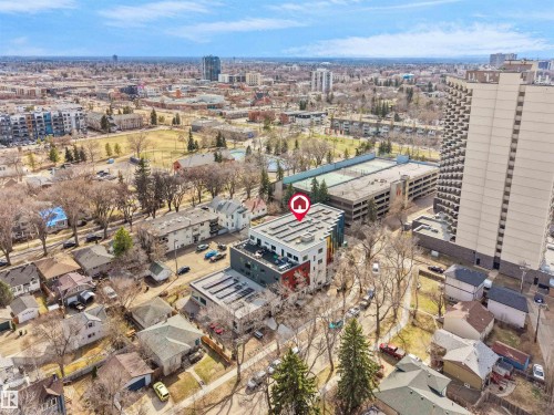 Modern multi-story building featuring a flat roofline and multi-colored facade elements - 403 10115 88 Avenue, Edmonton, AB - Outdoor With View