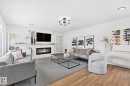 15011 77 Avenue, Edmonton, AB  - Indoor Photo Showing Living Room With Fireplace 