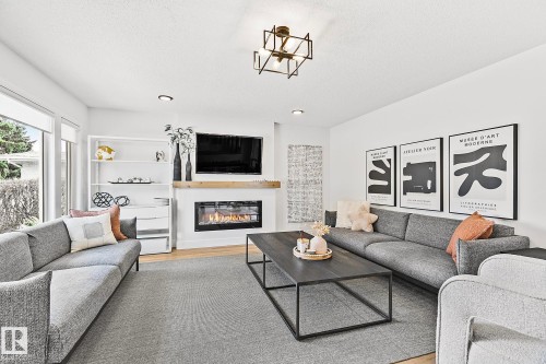15011 77 Avenue, Edmonton, AB - Indoor Photo Showing Living Room With Fireplace