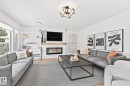 15011 77 Avenue, Edmonton, AB  - Indoor Photo Showing Living Room With Fireplace 