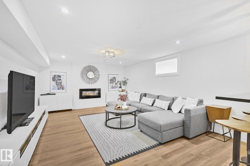 15011 77 Avenue, Edmonton, AB - Indoor Photo Showing Living Room With Fireplace