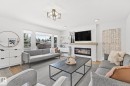 15011 77 Avenue, Edmonton, AB  - Indoor Photo Showing Living Room With Fireplace 