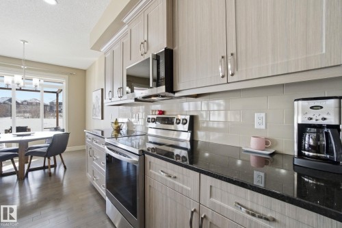 2133 Blue Jay Point(E), Edmonton, AB - Indoor Photo Showing Kitchen With Upgraded Kitchen