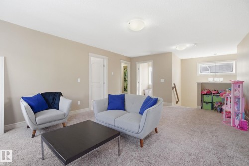 2133 Blue Jay Point(E), Edmonton, AB - Indoor Photo Showing Living Room