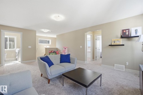 2133 Blue Jay Point(E), Edmonton, AB - Indoor Photo Showing Living Room