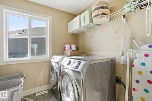 2133 Blue Jay Point(E), Edmonton, AB - Indoor Photo Showing Laundry Room