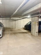 Designated parking space with concrete flooring - 